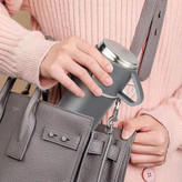 فلاسک استیل سهکاپ بههمراه سه فنجان استیل درون کیف مخصوص حمل و نگهداری